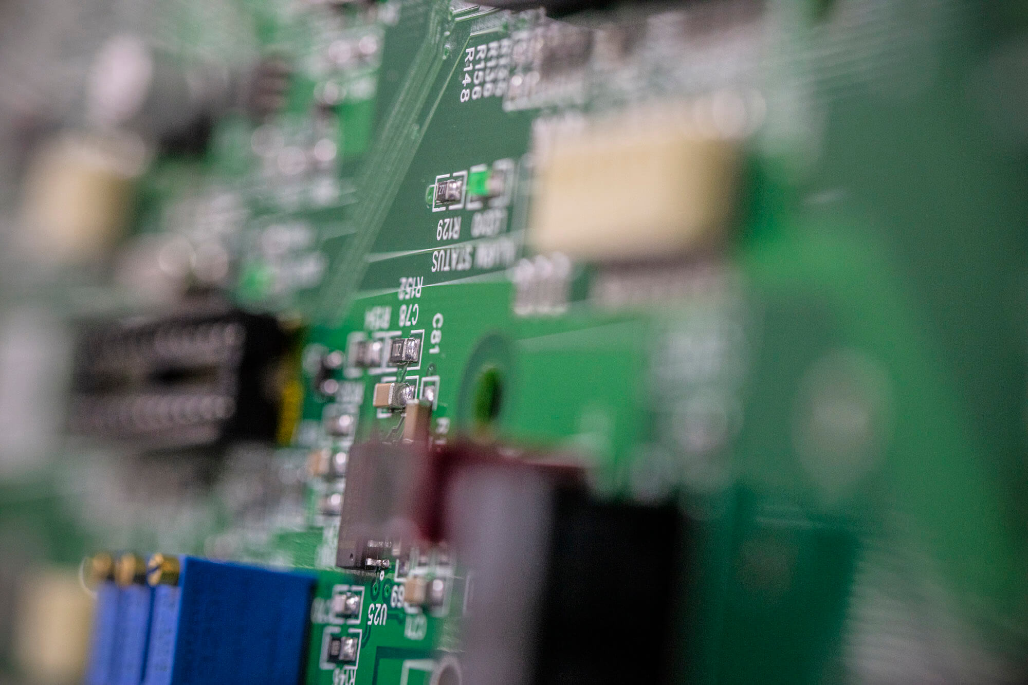 A close shot of a green EMSG circuit board.