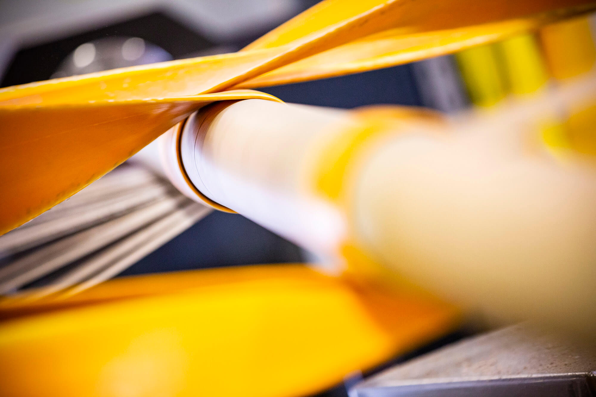 Close up shot of a roll of cardboard being made.