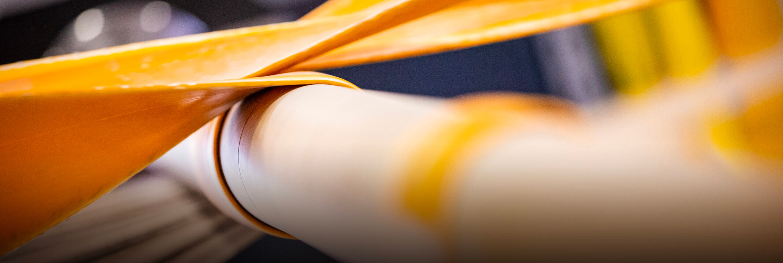 Close up shot of a roll of cardboard being made.