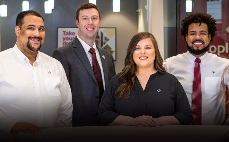 The team photo of staff at Peoples Bank