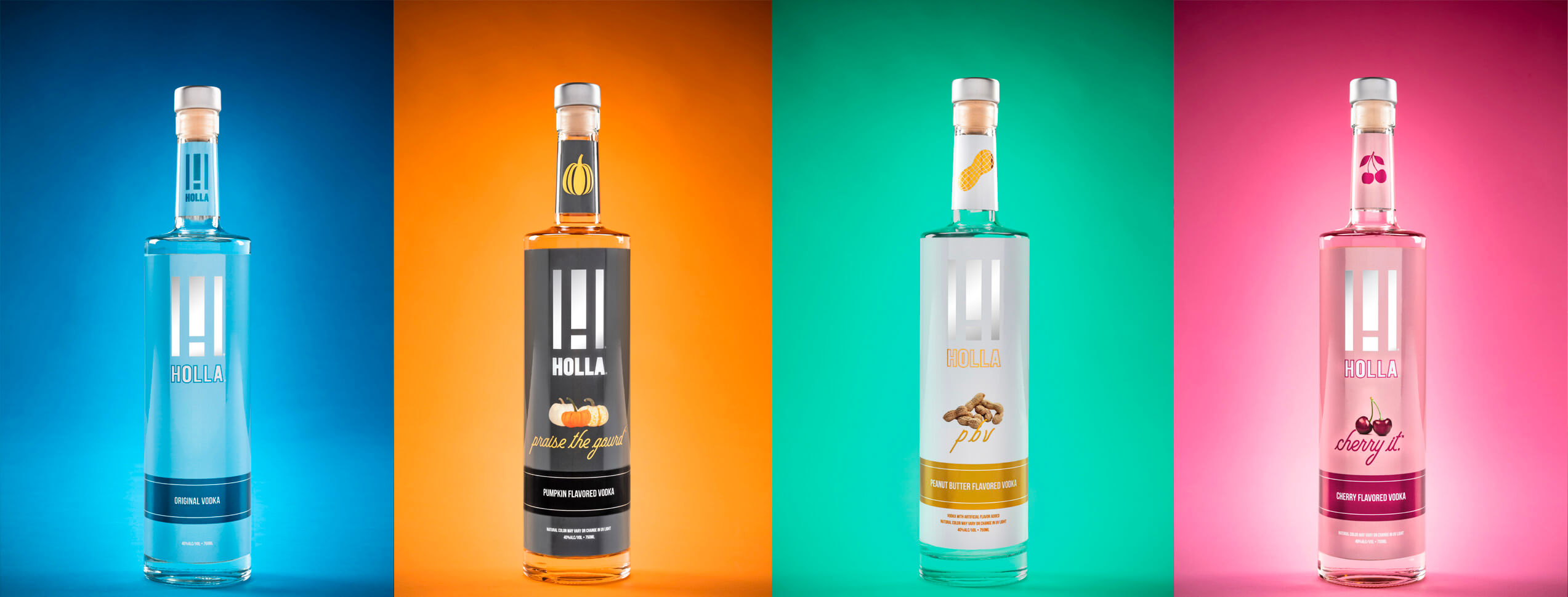 Four bottles of Holla vodka in different flavors.