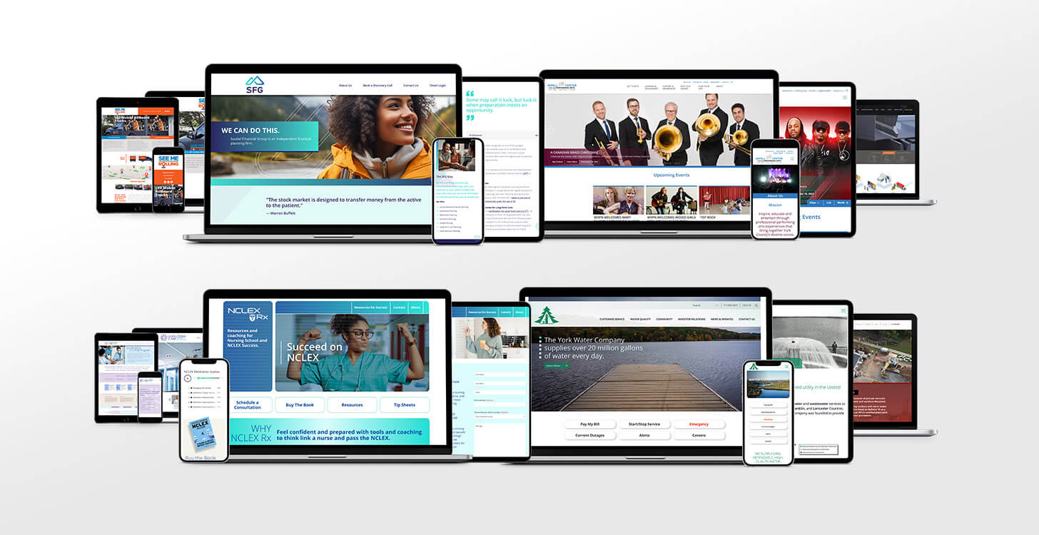 Four websites displayed on different sized computer monitors.