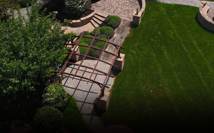 A garden with grass and paths.