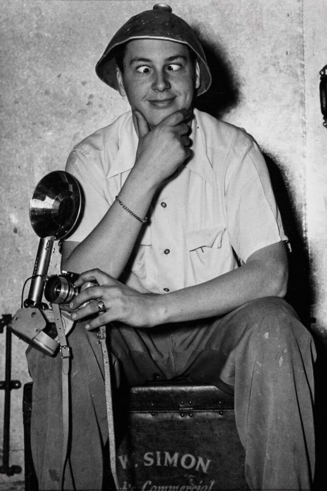 1950s photo of Jim Hayman Jr. with his camera.