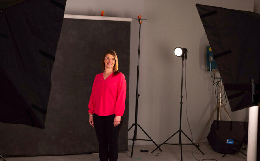 Person having their headshot taken at the studio.
