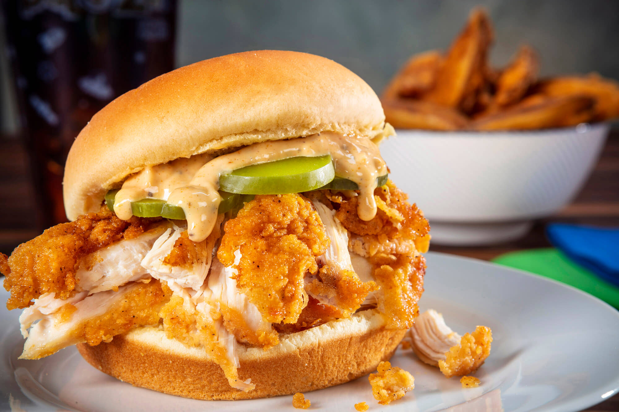 A chicken burger in a commercial food photo shoot for Royal Farms.