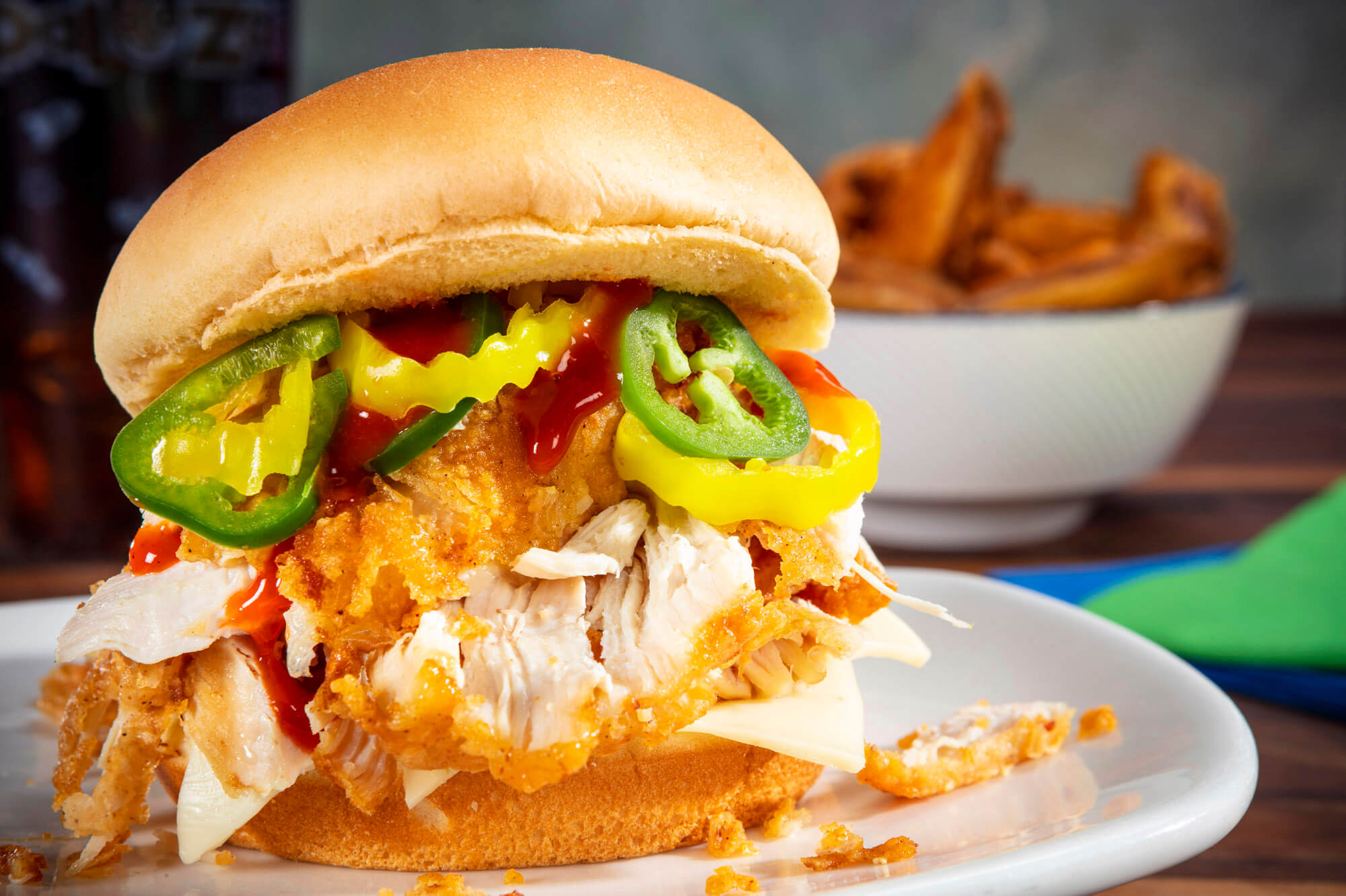 A chicken burger in a commercial food photo shoot for Royal Farms.
