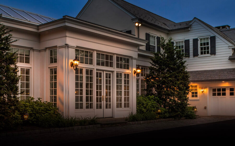 An image of a house showcasing Hanover Lantern light at dusk.